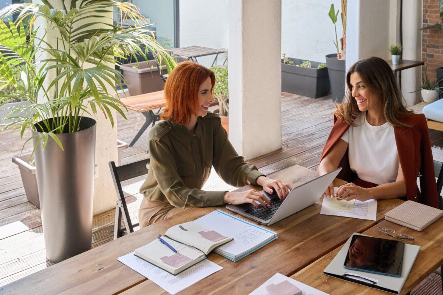 two women in a business meeting talking to each other