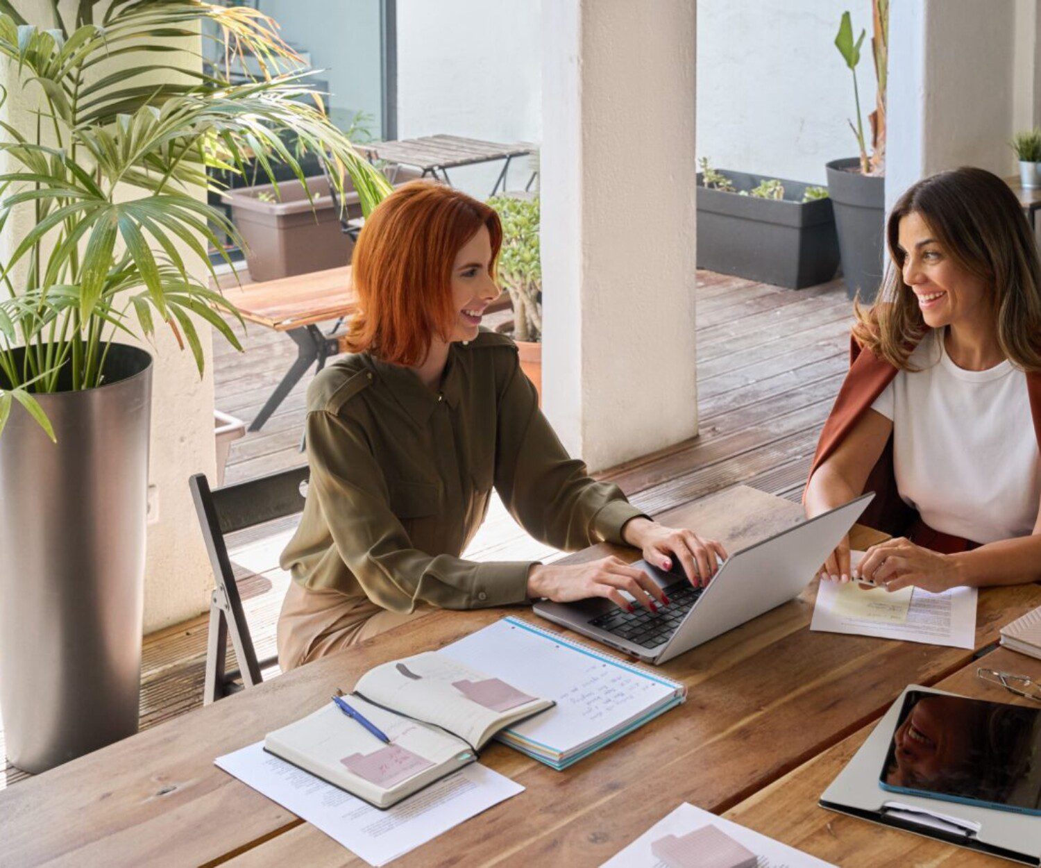 two women in a business meeting talking to each other