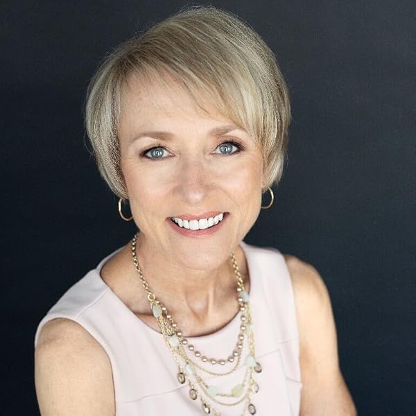 Headshot of a woman on a black background