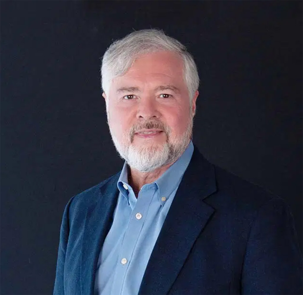 Professional headshot of John Hill, CEO of TechSage Solutions