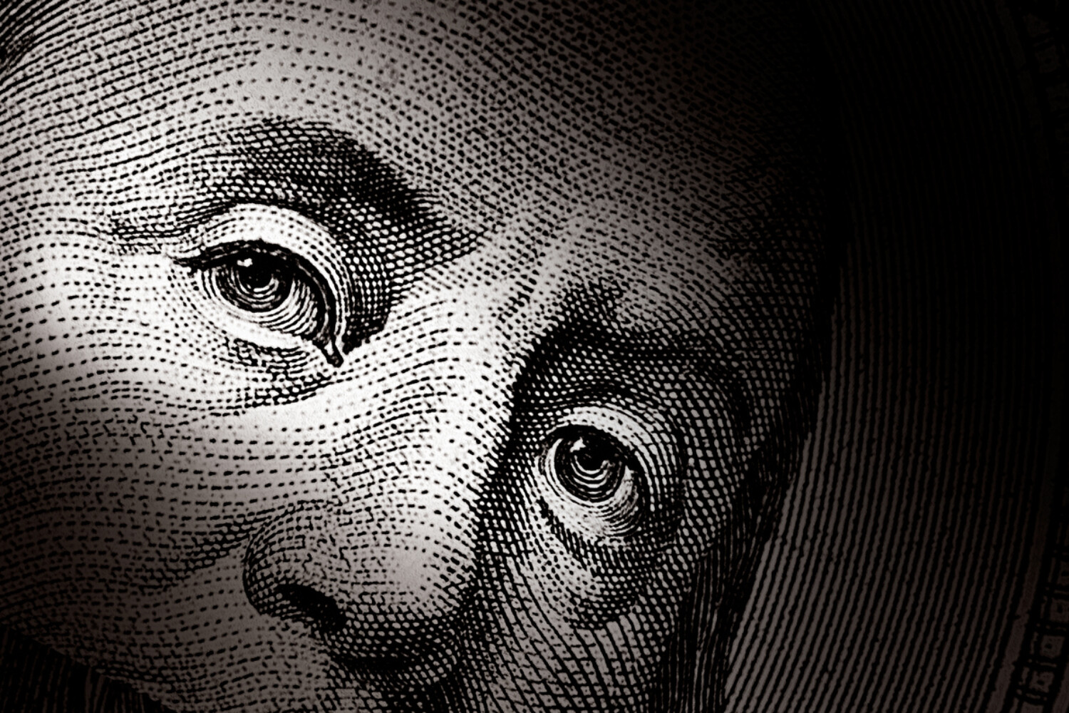 The eyes of Benjamin Franklin's portrait on the $100 bill