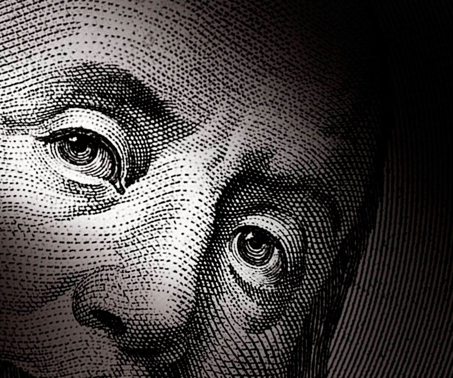 The eyes of Benjamin Franklin's portrait on the $100 bill